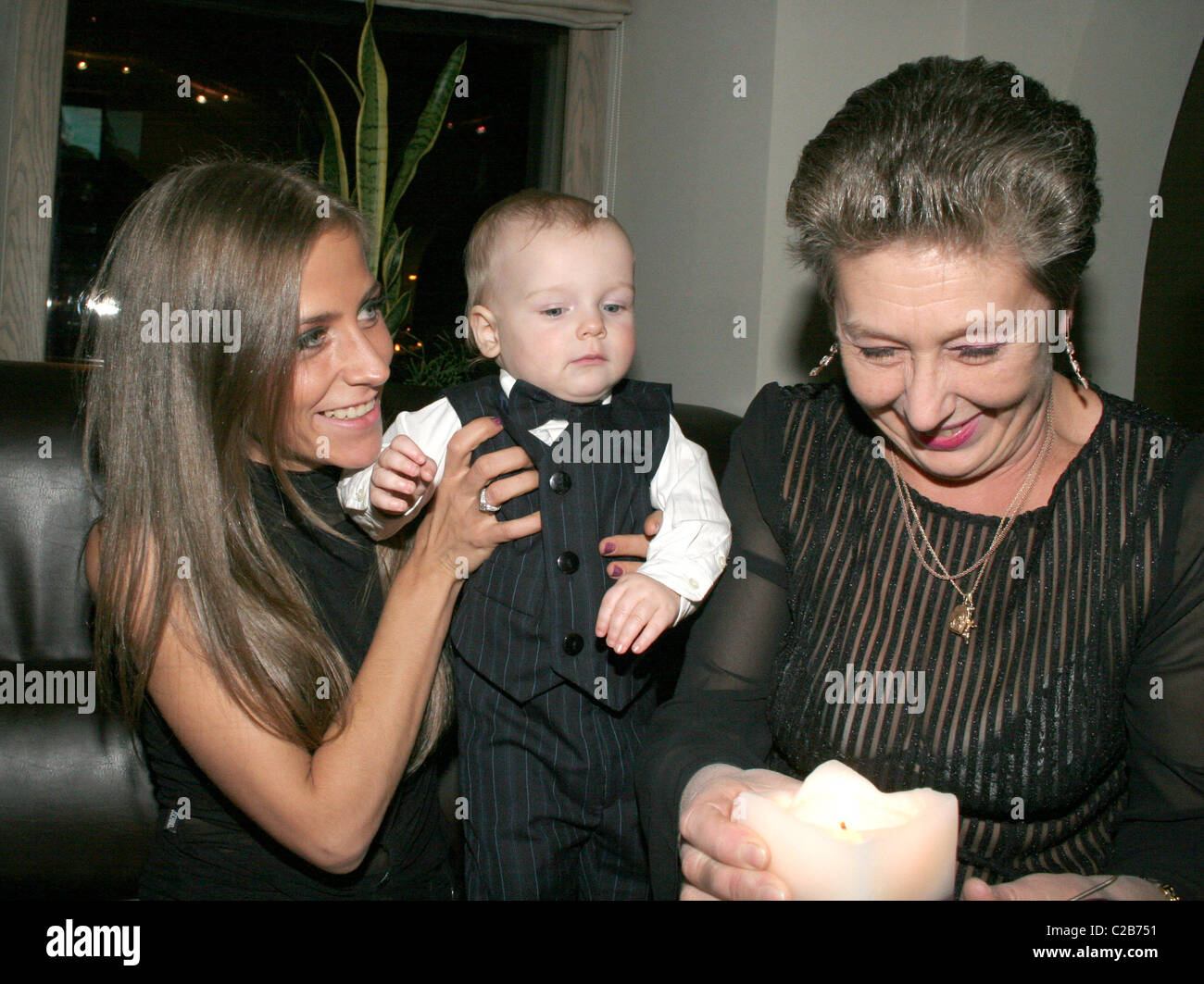 Andrey Arshavin`s wife Julia Arshavina (L) with their little son Artem ...
